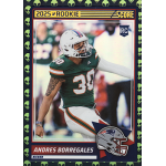 andres borregales 2025 score extraterrestrial sp rc Football trading card featuring a kicker in a green uniform, labeled 2025 Rookie with a helmet graphic.