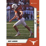 bert auburn 2023 onit university of texas University of Texas football player kicking a field goal during a game, wearing a burnt orange jersey and white helmet.