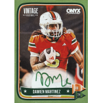 damien martinez 2024 onyx vintage green autograph Vintage football trading card featuring player in red uniform and helmet, holding a football, with signature.