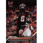 damien martinez 2023 bowman university now Football player in action, wearing black and orange uniform, carries the ball during a game in a stadium.