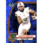 damien martinez 2024 bowman chrome university sapphire Football player in Miami uniform mid-action on a trading card. Blue abstract background, player number six visible.