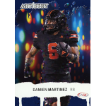 damien martinez 2025 sage blue artistry American football player in black uniform with number 6 runs against a colorful bokeh background.