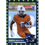 damien martinez 2025 score extraterrestrial rc 2025 rookie card of a football player in an orange uniform, running with the ball.