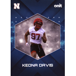 keona davis 2025 onit gravity nebraska Football player in action wearing a white jersey with the number 97, highlighted in a hexagonal frame with a cosmic background.