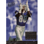 michael irvin 1994 fleer ultra michael irvin performance highlights 4 Football player in blue Dallas Cowboys jersey catching a pass, wearing '93 Fleer Ultra gear and white gloves.