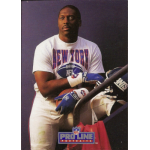 ottis anderson 1991 pro line portraits 116 Man in a New York NFL t-shirt holding sports gear next to a railing, with Proline Portraits logo at the bottom.