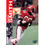 pee wee smith 1995 rel cfl Football player in red uniform runs with ball during game, wearing a helmet with a horse logo. Action shot.