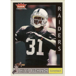 phillip buchanon 2003 fleer tradition 192 NFL football card of Raiders cornerback in black jersey on field. Fleer Tradition branding visible.