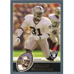 phillip buchanon 2003 topps 68 Football player in a white Raiders uniform, wearing number 31, in action on a sports trading card.