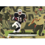 phillip buchanon 2003 fleer ultra gold medallion Oakland Raiders player running during a football game, wearing black and white uniform, holding a football.