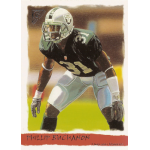 phillip buchanon 2002 topps gallery rc Football player in a black and silver uniform ready for action on a sports trading card.