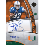 reggie wayne 2009 ultimate collection shout out Football card featuring player in blue jersey, signed The U, with team logos and Ultimate Shout Out text.