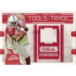 reggie wayne 2009 playoff absolute memorabilia red tools of the trade jsy Football card featuring Tools of the Trade with event-worn jersey swatch on the right and player running on the left.
