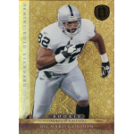 richard gordon 2011 panini gold standard rc Rookie football card featuring player in Oakland Raiders uniform, posed with the ball on a gold decorative background.