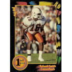 roland smith 1991 wild card rc Football card featuring player in white and orange uniform, ready to play. Wild Card 1st Edition, cornerback position.