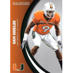 sam shields 2015 panini university of miami 060 silver Football player in orange Miami jersey, wearing helmet, in action pose on a Panini card. Number 9 visible.