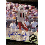 scott covington 1999 press pass autograph Football player throwing a pass on a sports card with a signature and authenticity stamp.