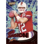 scott covington 1999 pacific revolution red rc Football player holding a ball, wearing a red jersey with number 12 and helmet against a vibrant, patterned background.