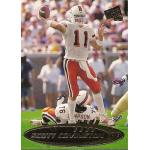 scott covington 1999 press pass gold Quarterback in white uniform about to pass football on a stadium field during a game.