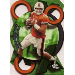 scott covington 1999 press pass xo rc Football player in orange jersey holding a ball, mid-action with a dynamic green and orange background design.