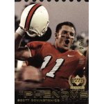 scott covington 1999 upper deck century legends century collection rc Football player in red jersey celebrating on a sports card with helmet raised, Upper Deck branding visible.