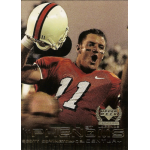 scott covington 1999 upper deck century rc Football player celebrating with helmet raised, wearing a jersey number 11, featured on a sports trading card.