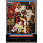sean taylor 2004 bowman rc Football player in action during a game on a collectible card.