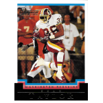 sean taylor 2004 bowman white rc American football player in full gear holds the ball during a game on a vintage trading card.