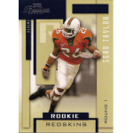 sean taylor 2004 playoff prestige rc Rookie football card featuring player in orange uniform running on field, titled Redskins with Sean Taylor noted.