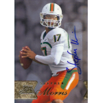 stephen morris 2014 flair showcase row 1 autograph Football player in white and orange uniform holding a football, ready to throw. Sports card with autograph.