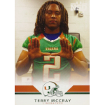 terry mccray 2014 miami hurricanes national signing day rc Football player in a green jersey with number 2 making a U gesture with hands, standing indoors.