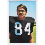 tony cline 1972 nflpa wonderful world of pro football stamp Football player wearing jersey number 84, standing outdoors on a sunny day, looking confidently ahead.