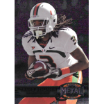 travis benjamin 2012 fleer retro m66 rc Football player in white and orange uniform running with a ball during a game.