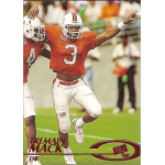 tremain mack 1997 press pass red zone rc Football player in orange jersey celebrating on the field during a game.