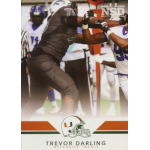 trevor darling 2014 miami hurricanes national signing day rc Football player in action blocking an opponent on the field, wearing a black uniform.