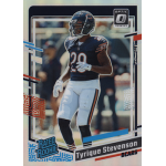 tyrique stevenson 2023 donruss optic silver rc Football player in dark uniform on sports card labeled Rated Rookie and Bears, standing on a field.