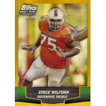 vince wilfork 2004 topps draft picks and prospects gold refractor rc Football trading card featuring a defensive tackle in an action pose wearing an orange uniform, labeled Topps Rookie Card.