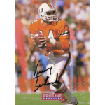 vinny testaverde 1992 pro line portrait autograph 3 Football player in orange uniform preparing to pass on a Pro Line card.