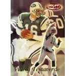 vinny testaverde 1999 topps gold label class 2 red one of one front NFL player in action holding a football, wearing a green and white jersey. Football card with dynamic action poses.