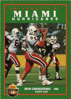 University of Miami football player in action, wearing white uniform, holding a football. Text: Miami Hurricanes, Rob Chudzinski.