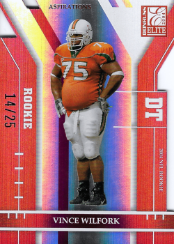 Football trading card featuring a player in an orange uniform, labeled DT, number 75, with colorful design details.